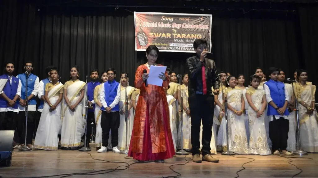 a chorus group singing together on stage