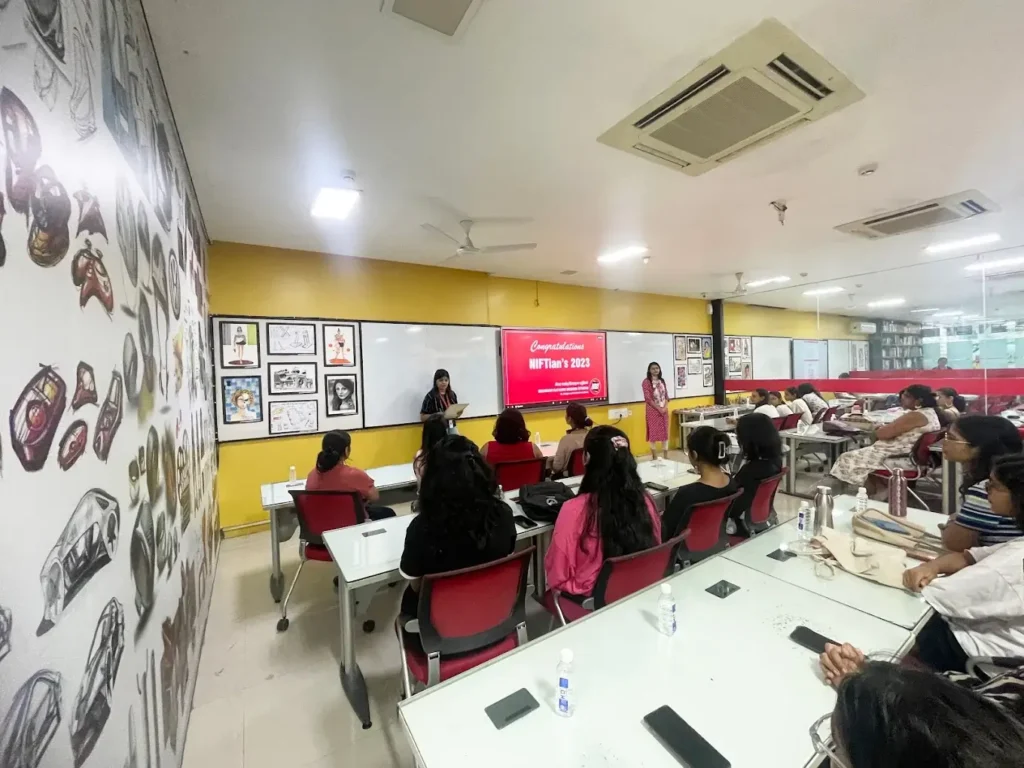 students preparing for entrance exam of fashion design