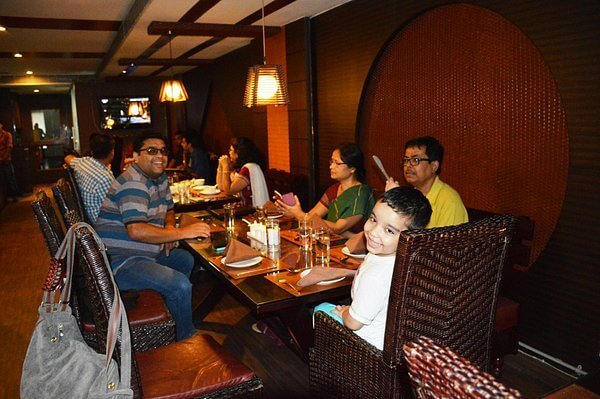 family enjoying meal at a restaurant