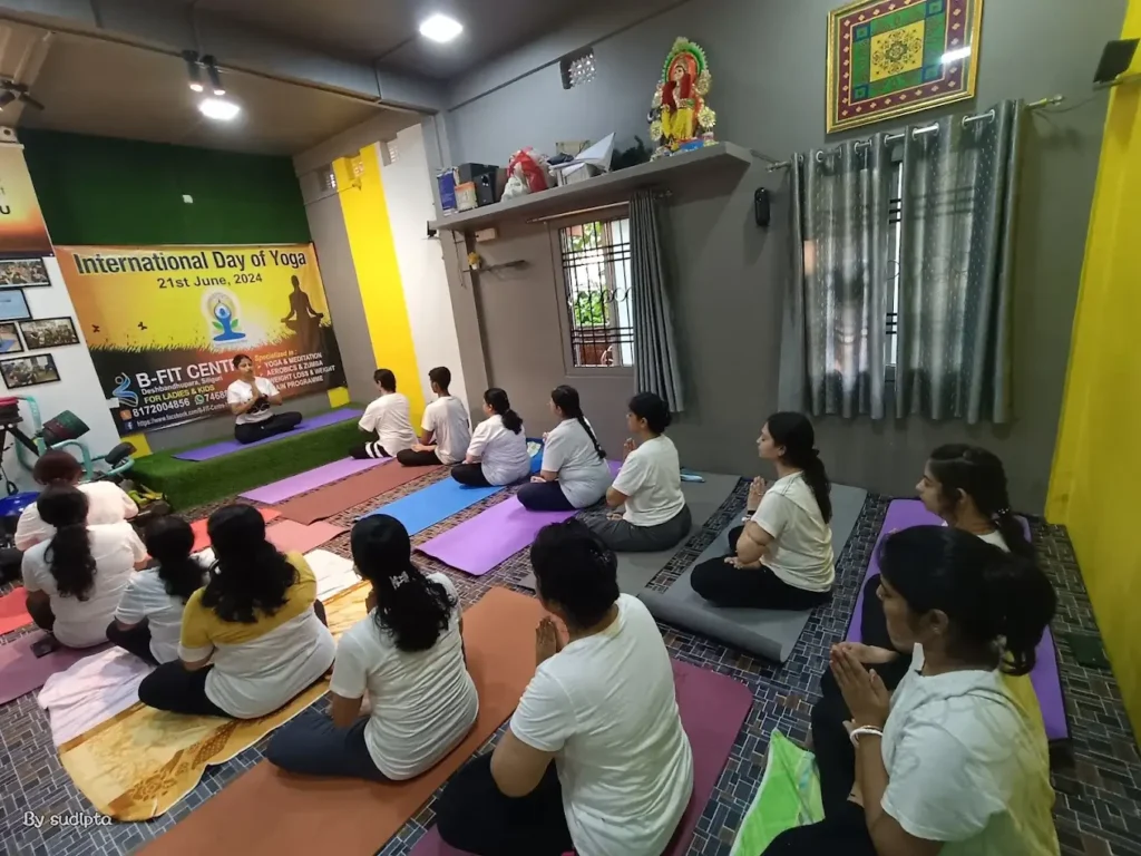 a group of people practicing meditation